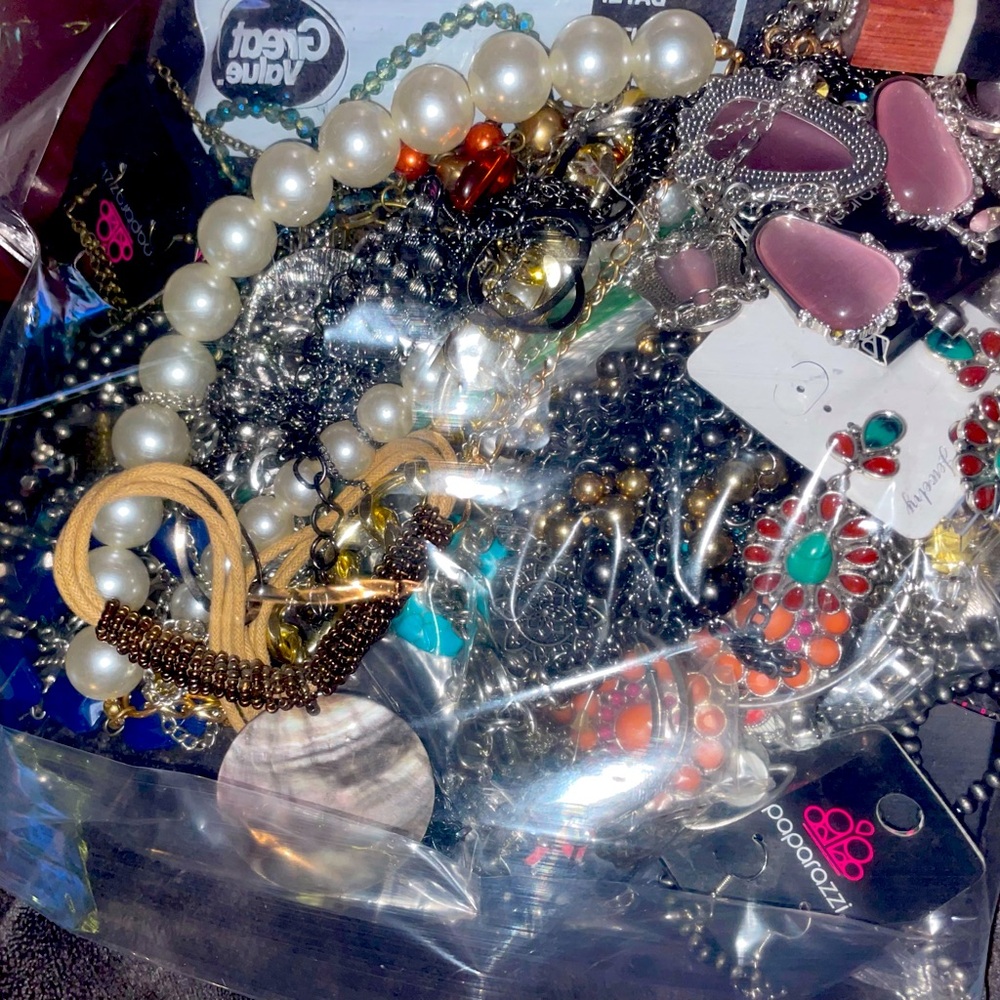 Bag of new and like new jewelry. Pieces from Paparazzi, Plunder, and more.